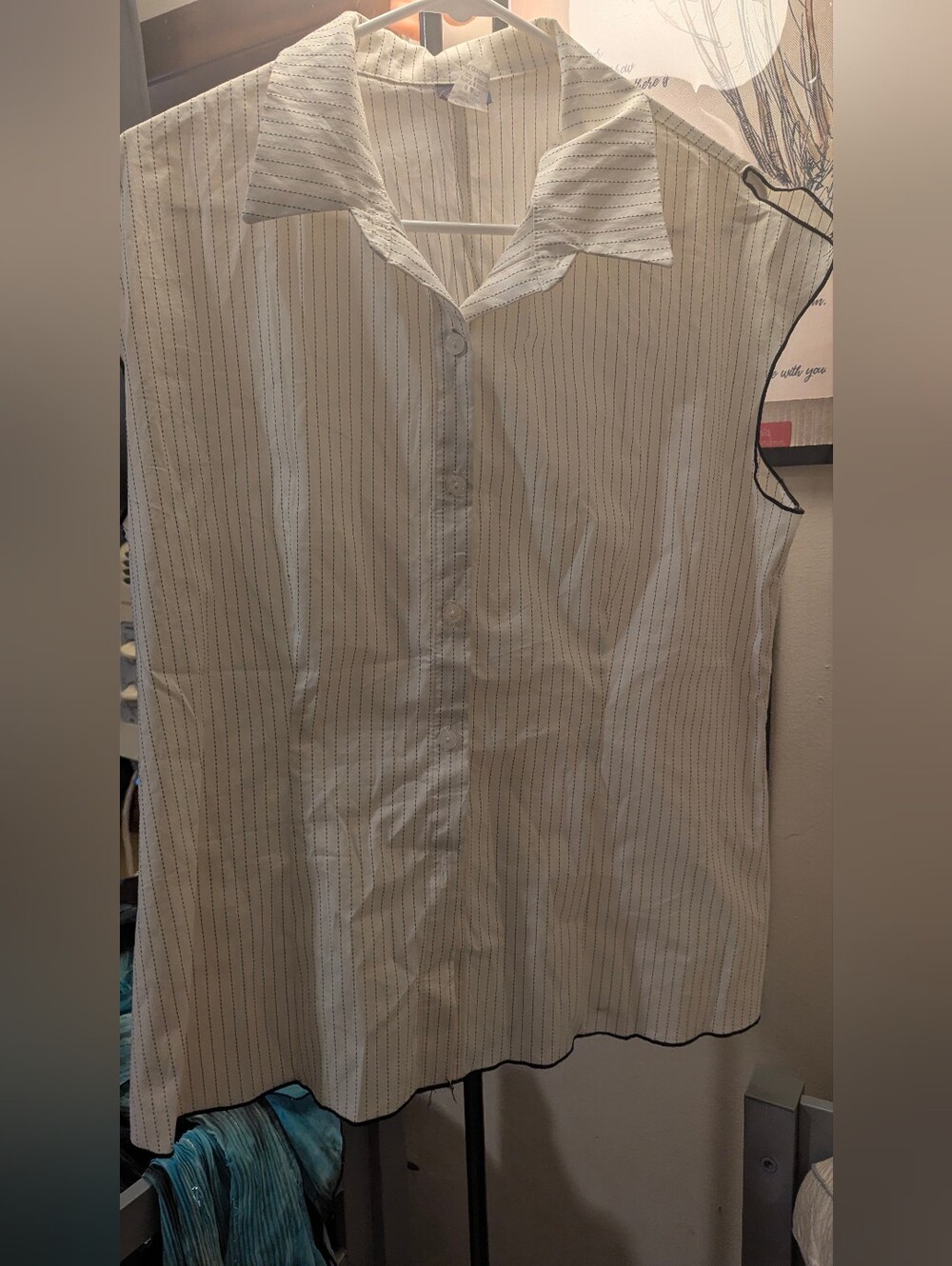 sleeveless button-up blouse